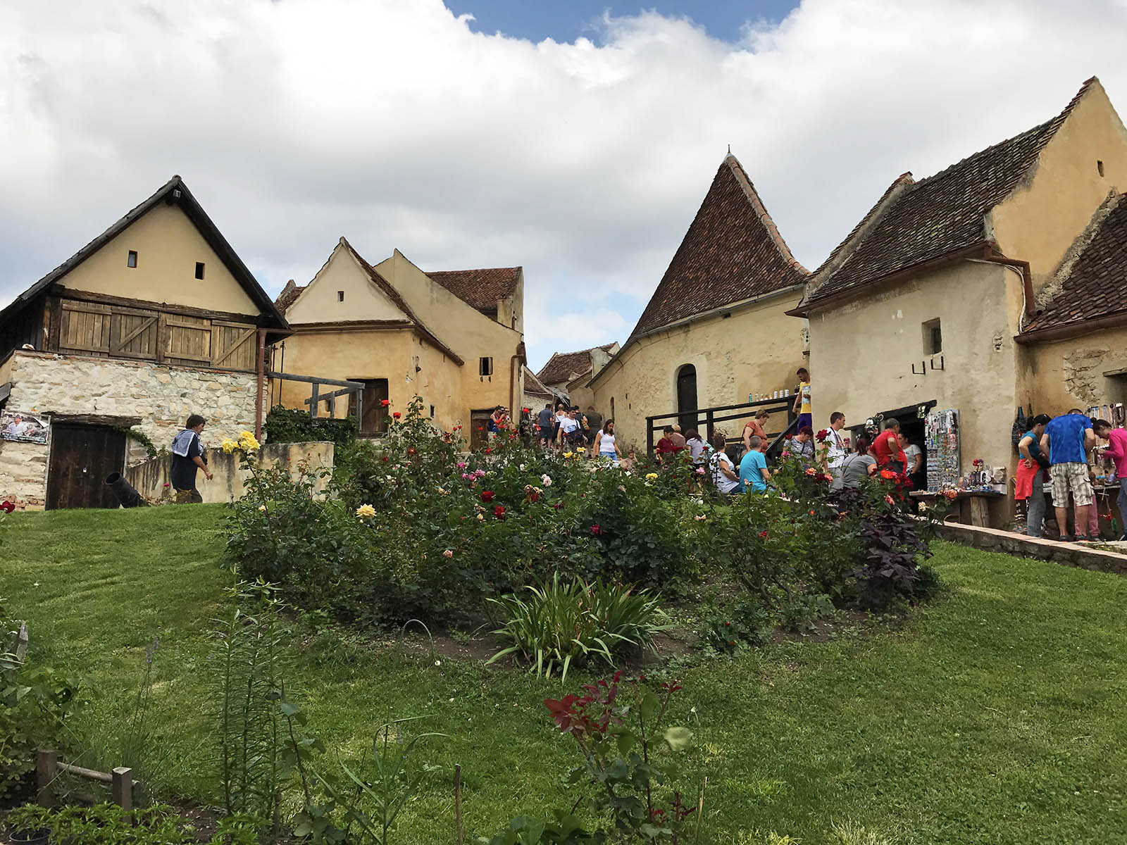 The interior courtyard of Rasnov Fortress hosts enchanting medieval tile-roofed houses. Credit: Carolina Valenzuela